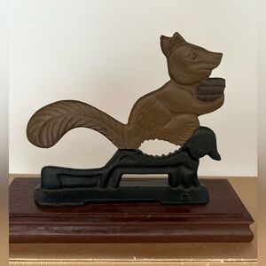 VTG Cast Iron Squirrel Nut Cracker on Wooden Base.